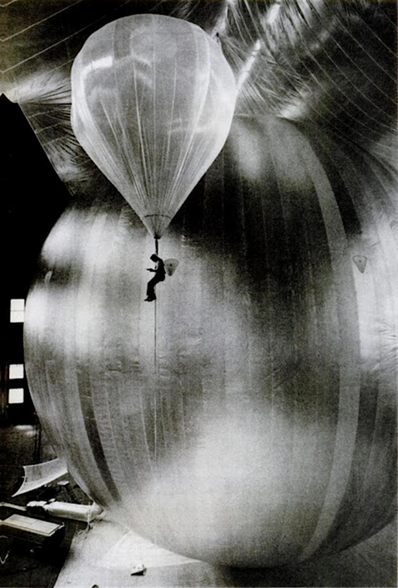 Technician floating up and down to inspect Echo II