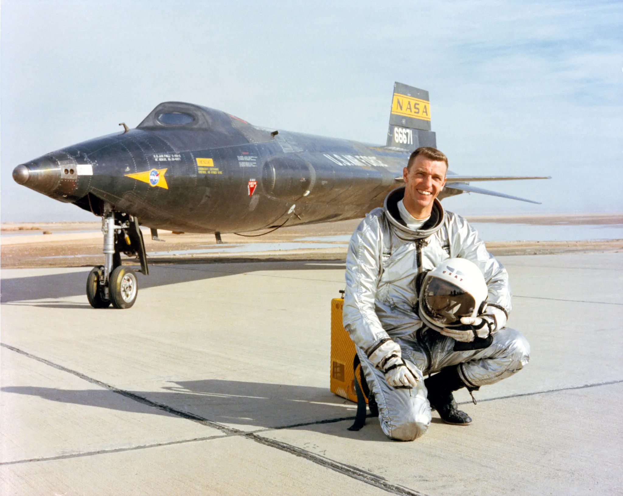 On 29 June 1965, a young Air Force test pilot rode a rocket-powered airplane to 280,600 feet above the California desert. He landed ten minutes later as the youngest person ever to earn astronaut wings.